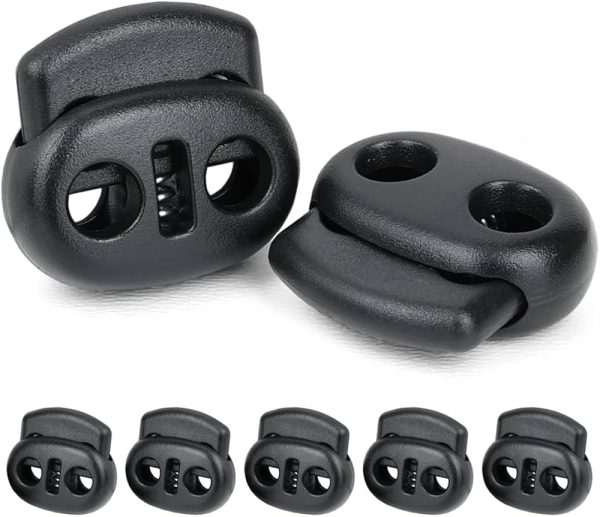 Plastikiniai virvelių fiksatoriai (2 angų, su spyruokle) 24 mm x 20 mm
