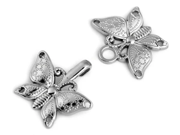 Metalinis dekoratyvinis užsegimas 36 mm x 23 mm