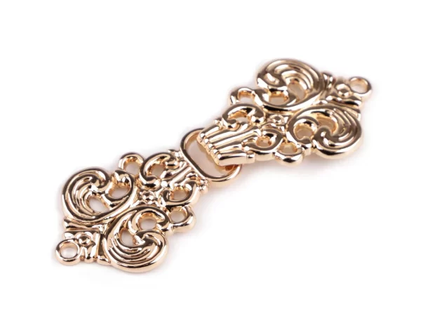 Dekoratyvinis metalinis užsegimas 59 mm x 21 mm "A"